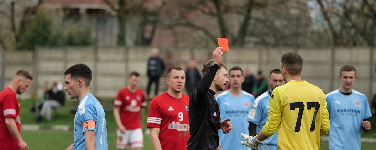 What does a red card mean in football?